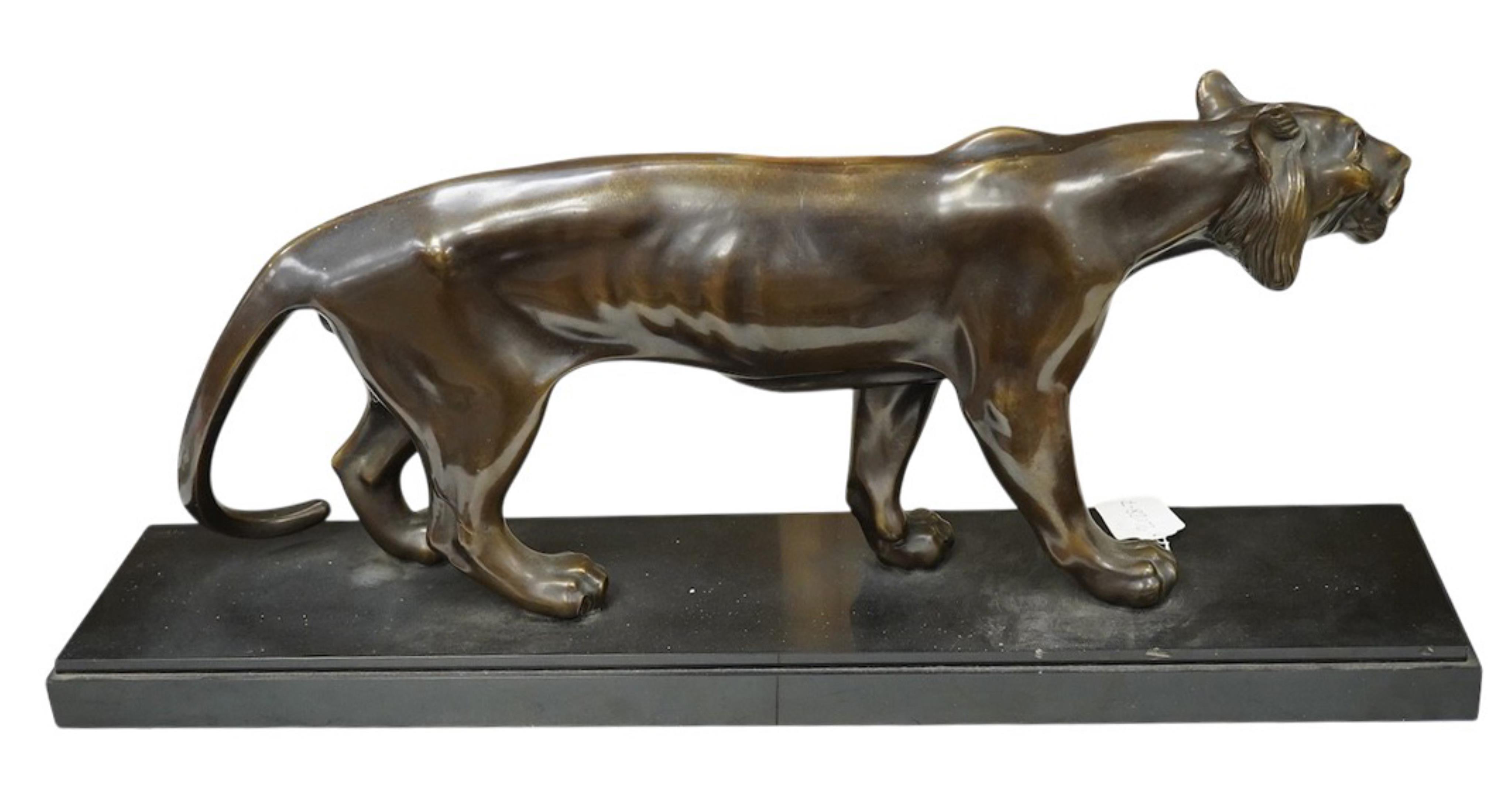 Manner of Maurice Font (19th/20th century): An Art Deco style bronzed spelter model of a tiger